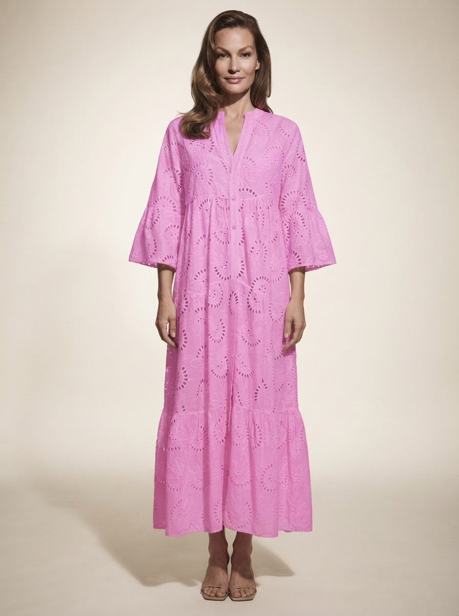 Model wearing pink lace v-neck bell sleeve maxi dress
