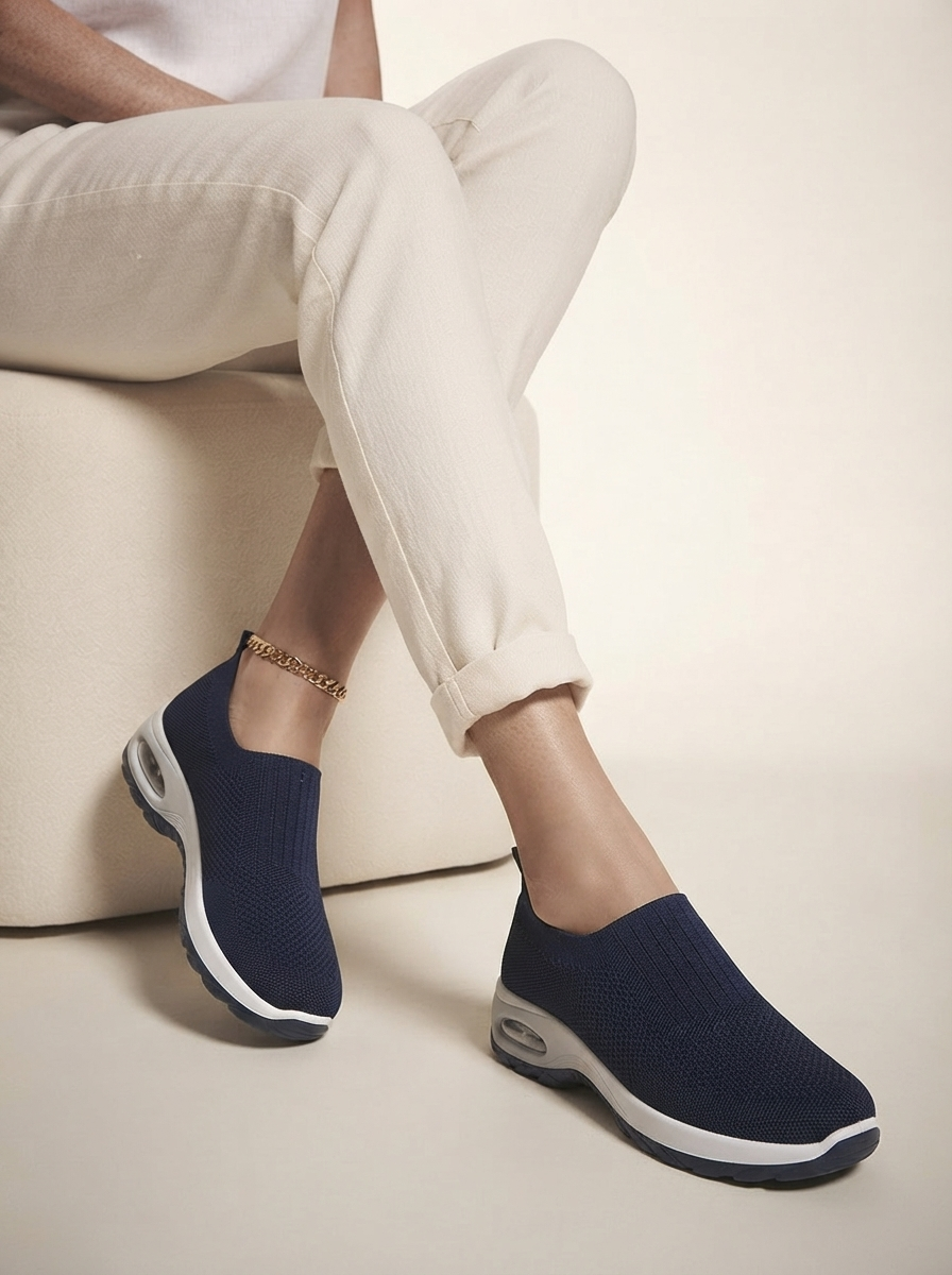 Close-up of model wearing blue air-cushion hiking shoes