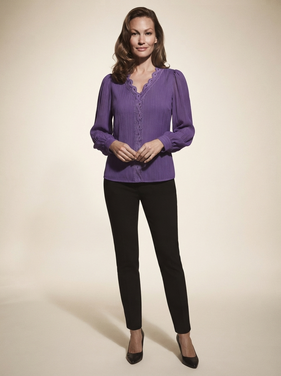 Model wearing purple chiffon blouse with lace details