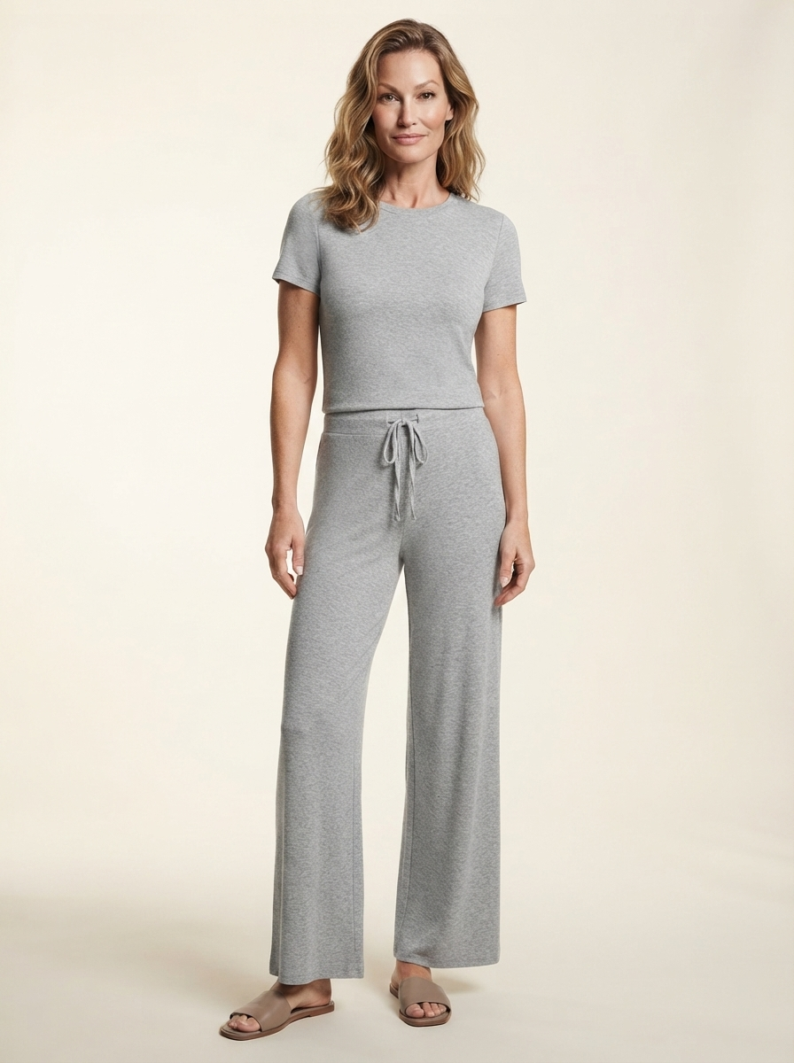 Model wearing grey round neck top and pants lounge set