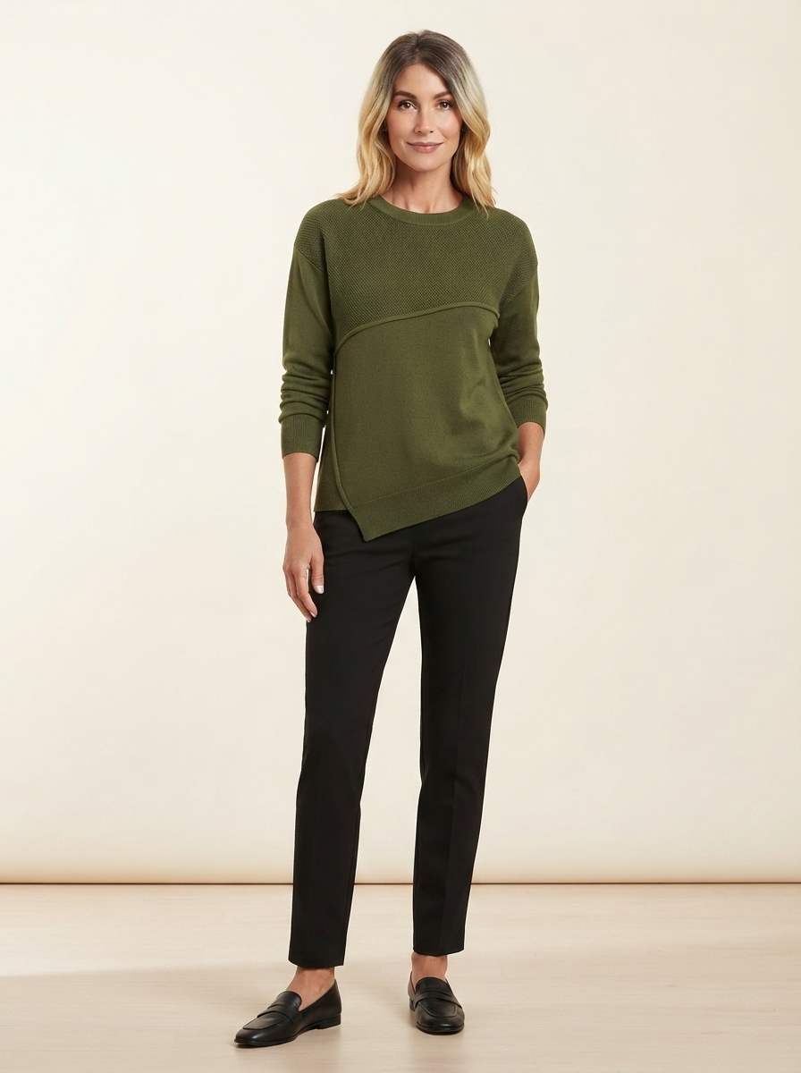 Model wearing army green asymmetric stitch knit sweater