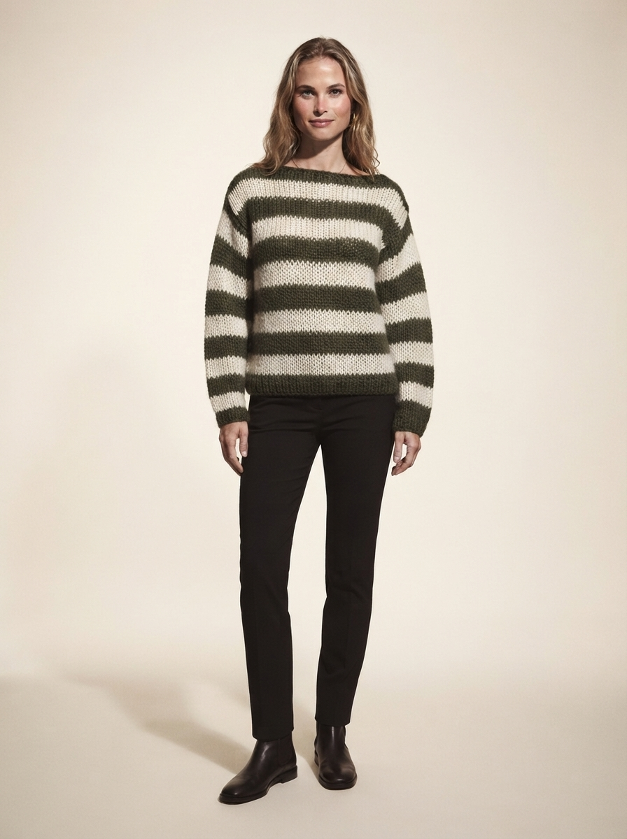 Model wearing army green striped knit pullover sweater