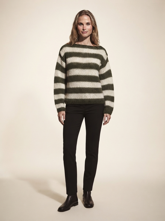 Model wearing army green striped knit pullover sweater