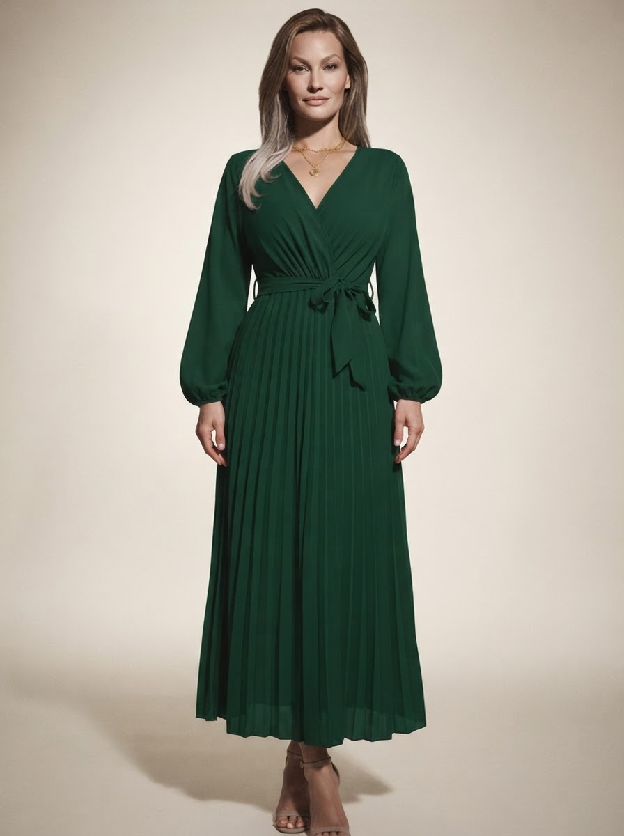 Model wearing green cross-pleated maxi dress