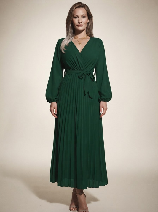 Model wearing green cross-pleated maxi dress