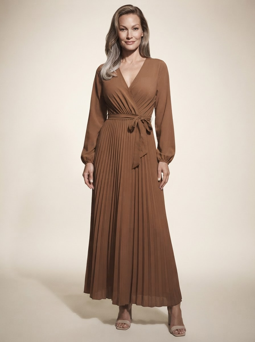 Model wearing brown cross-pleated maxi dress