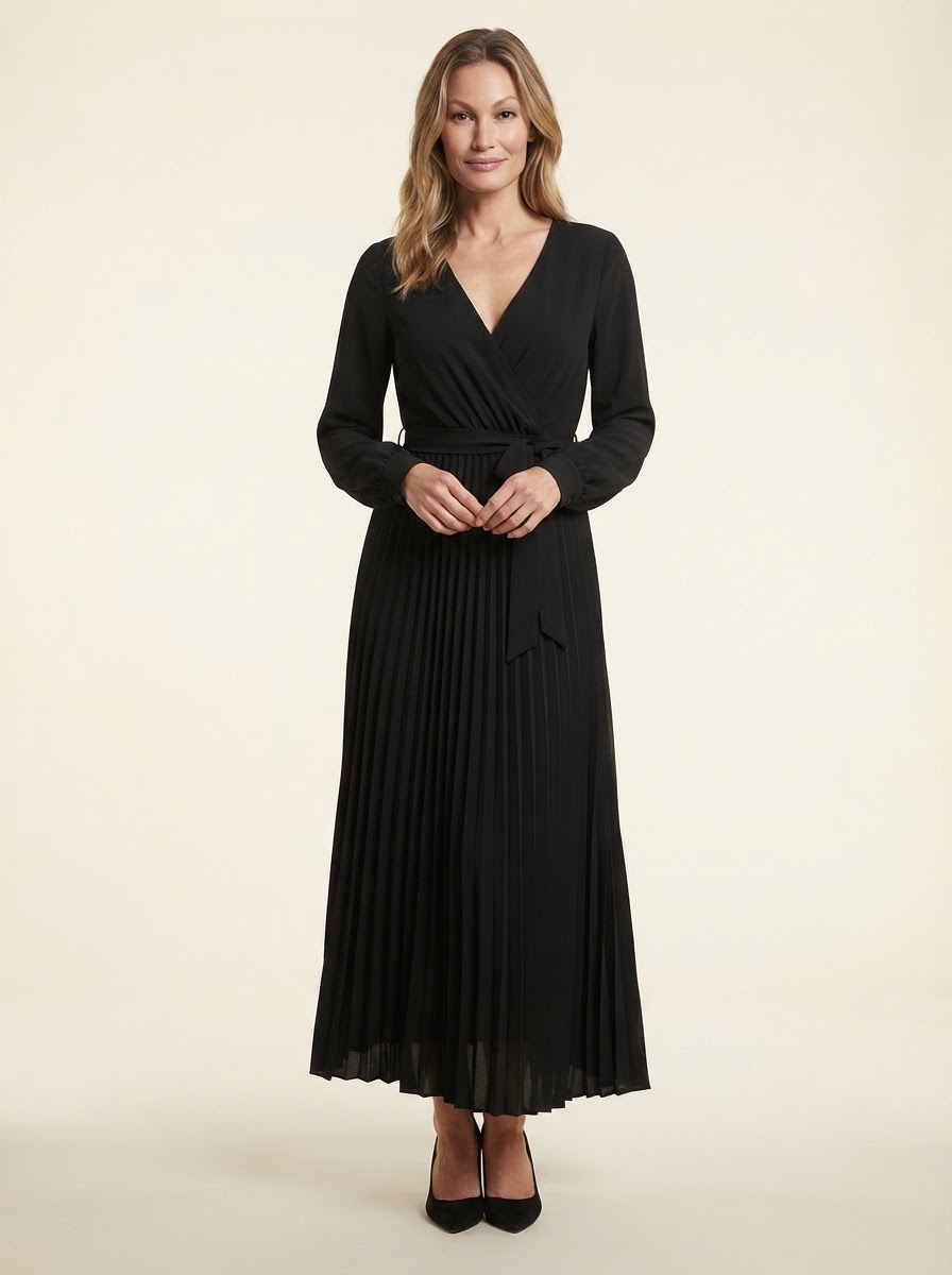 Model wearing black cross-pleated maxi dress