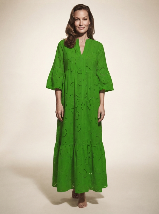 Model wearing green lace v-neck bell sleeve maxi dress