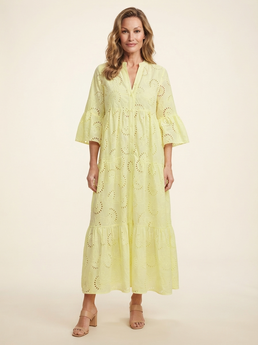 Model wearing yellow lace v-neck bell sleeve maxi dress