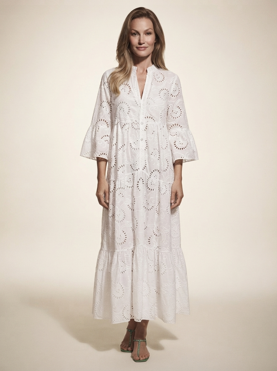 Model wearing white lace v-neck bell sleeve maxi dress