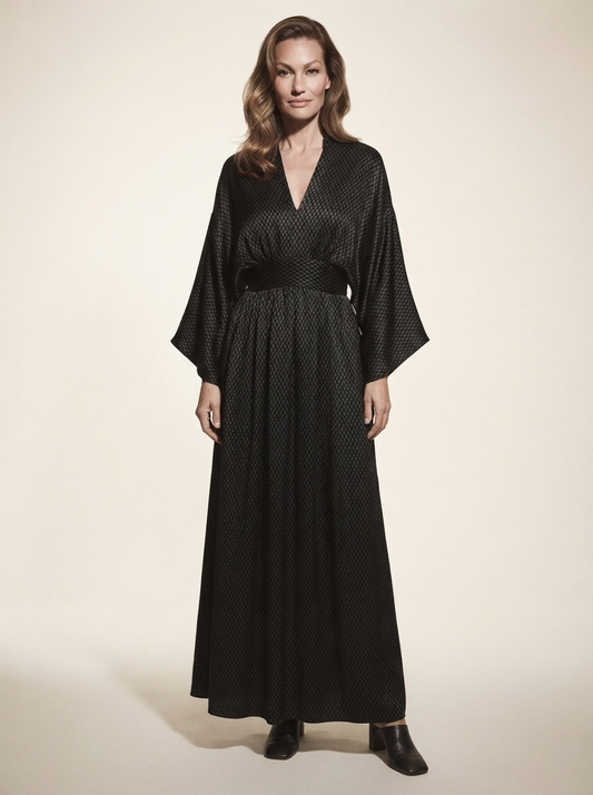 Model wearing black v-neck batwing sleeve maxi dress