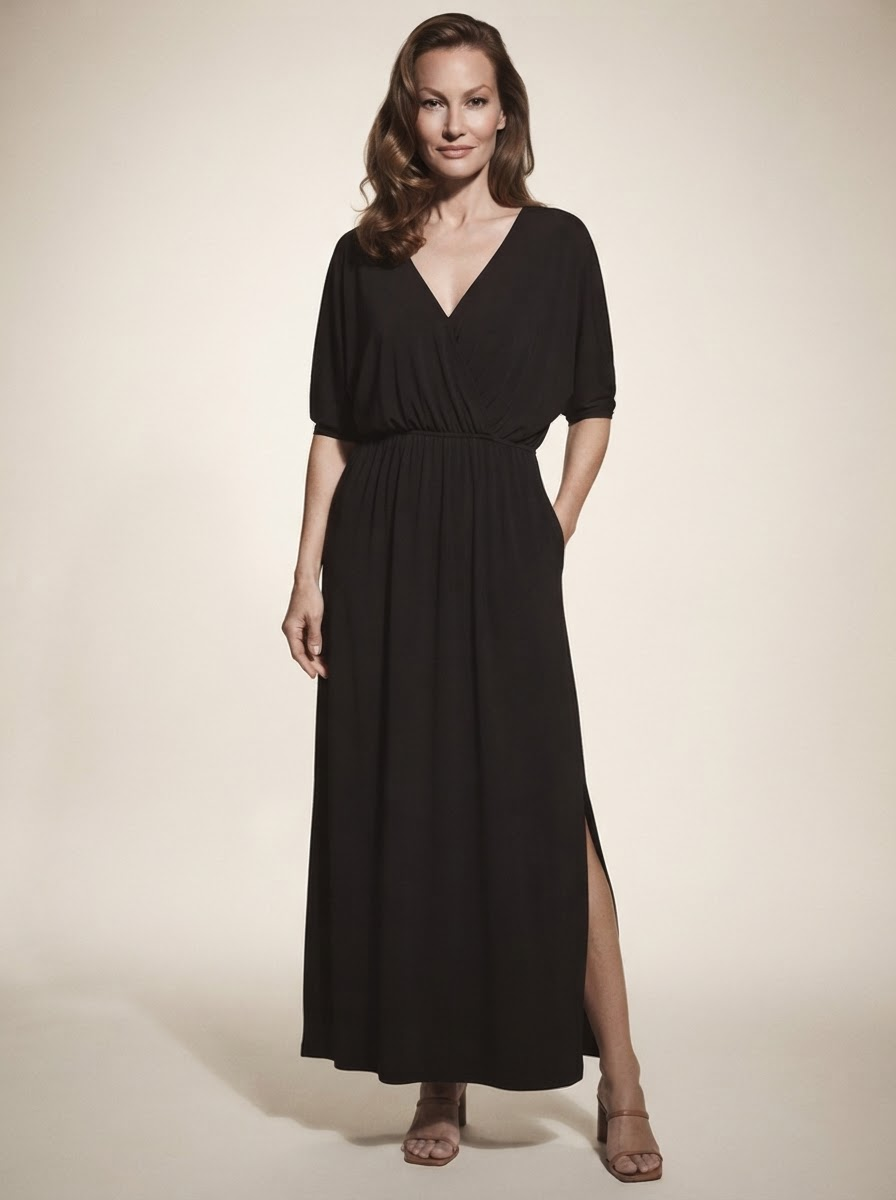 Model wearing black v-neck side-slit maxi dress