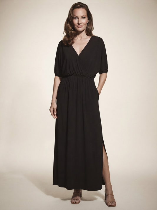 Model wearing black v-neck side-slit maxi dress
