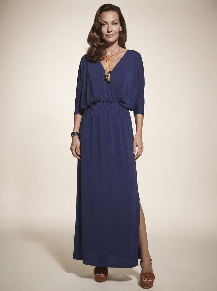 Model wearing dark blue v-neck side-slit maxi dress