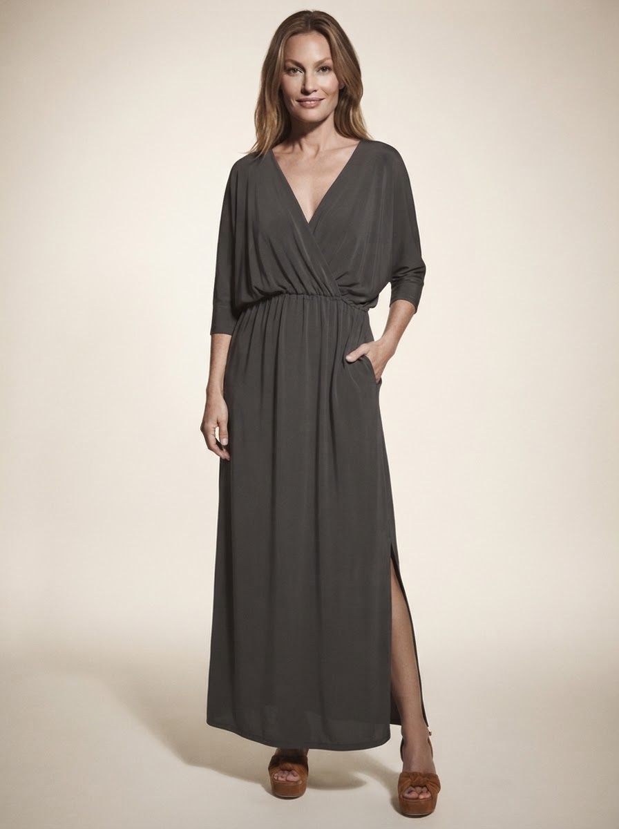 Model wearing dark gray v-neck side-slit maxi dress