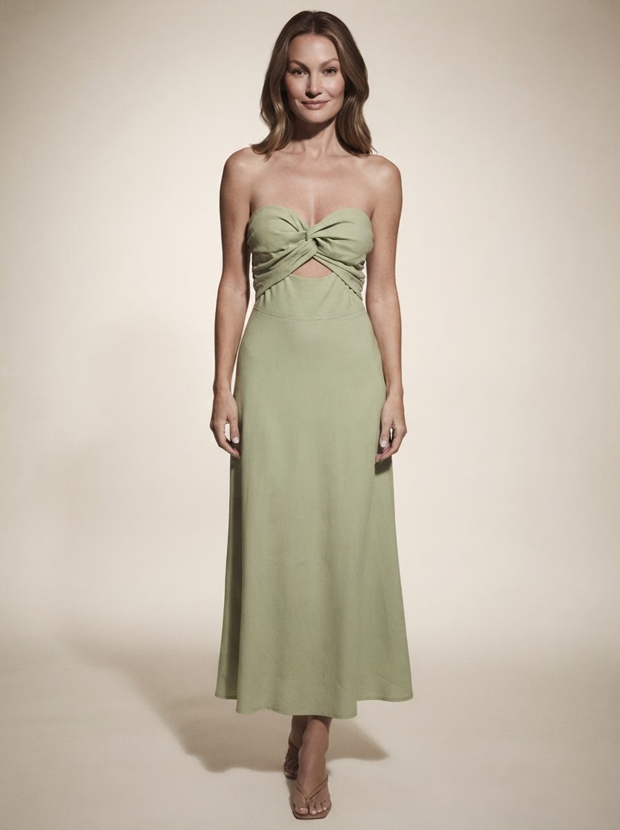 Model wearing green wrap top maxi dress